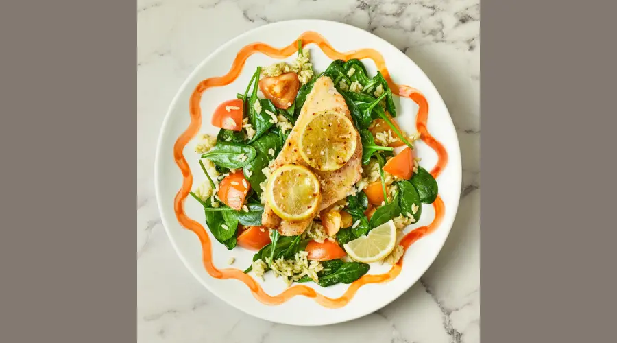 Lemon butter Basa with tomato spinach pesto rice